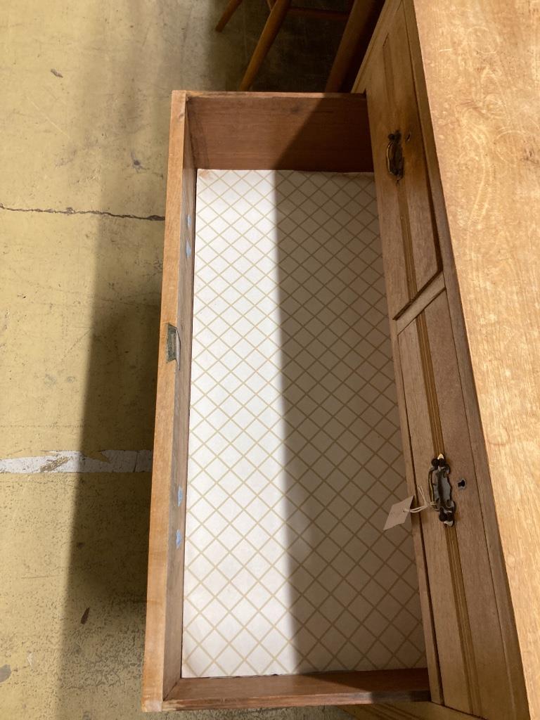 An Edwardian pine four drawer chest